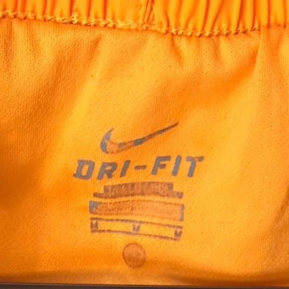 Nike orange Tempo Dri-Fit running shorts